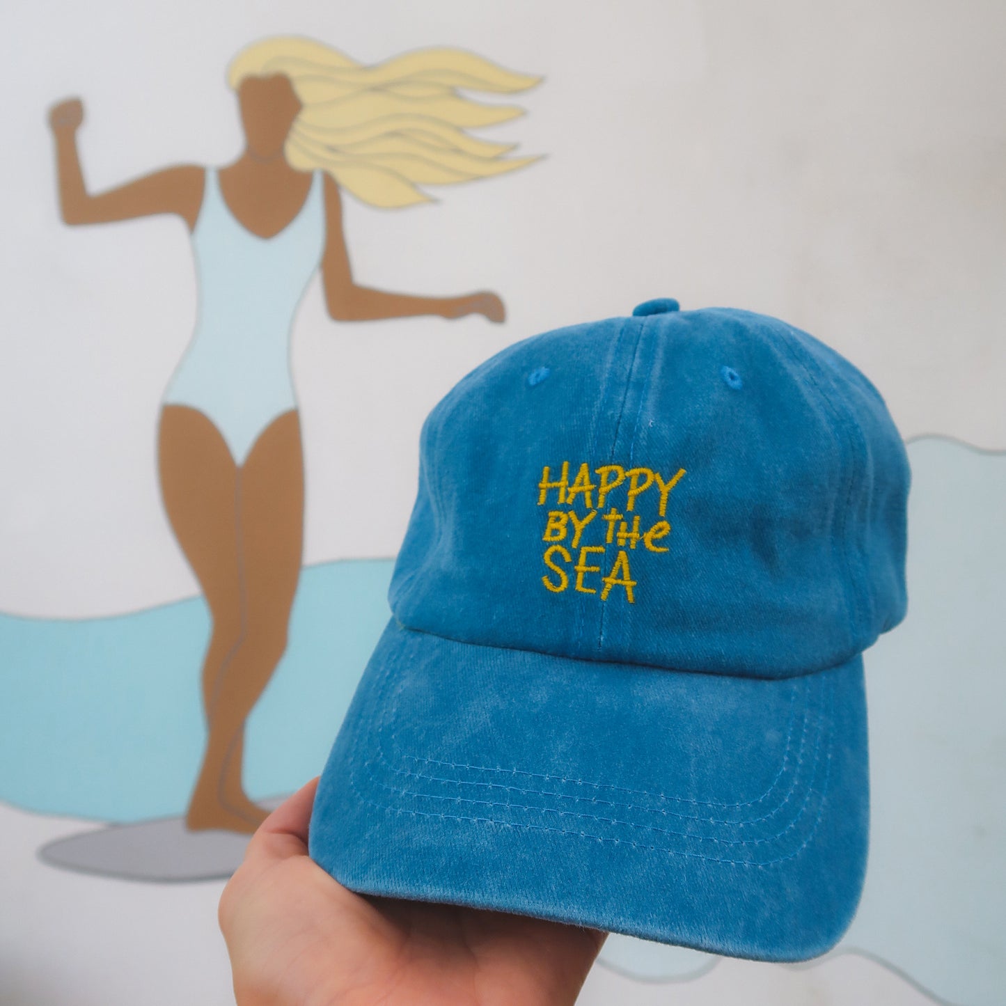 HAPPY BY THE SEA